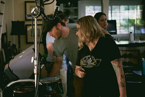 Eslyn and THE ONE I LOVE director Charlie McDowell discuss a scene. Photo: Sean O'Malley.