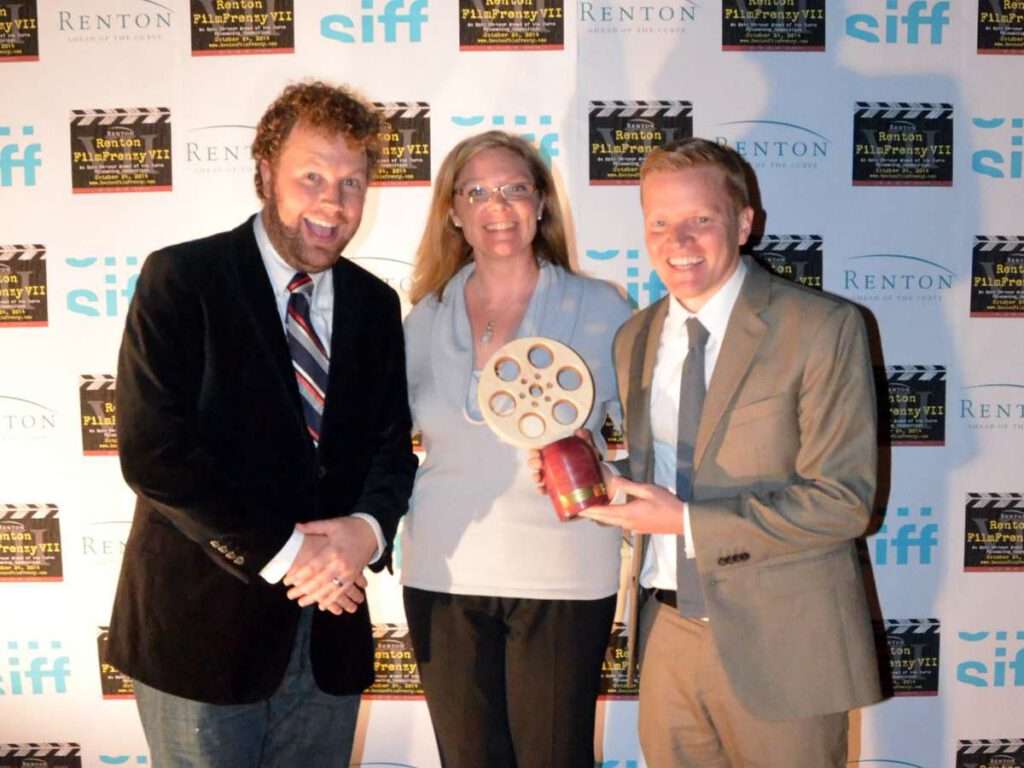 Amy Lillard with the Best Picture Award recipients. Photo credit: Kelly Balcomb-Bartok