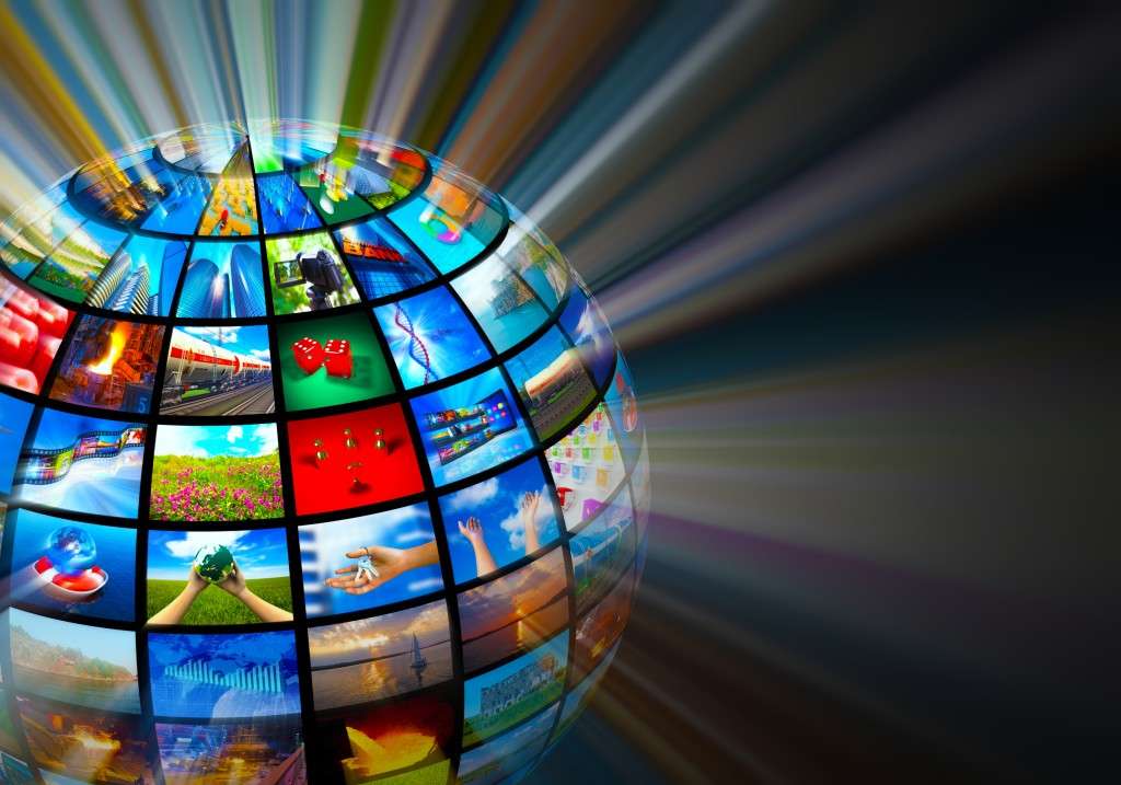 Creative media technologies concept: glowing sphere with images on black background