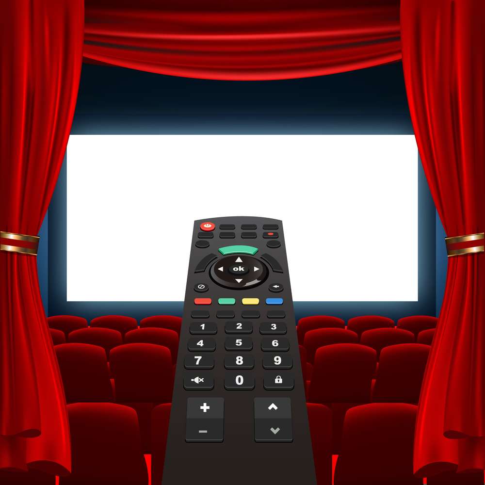 tv remote and cinema screen