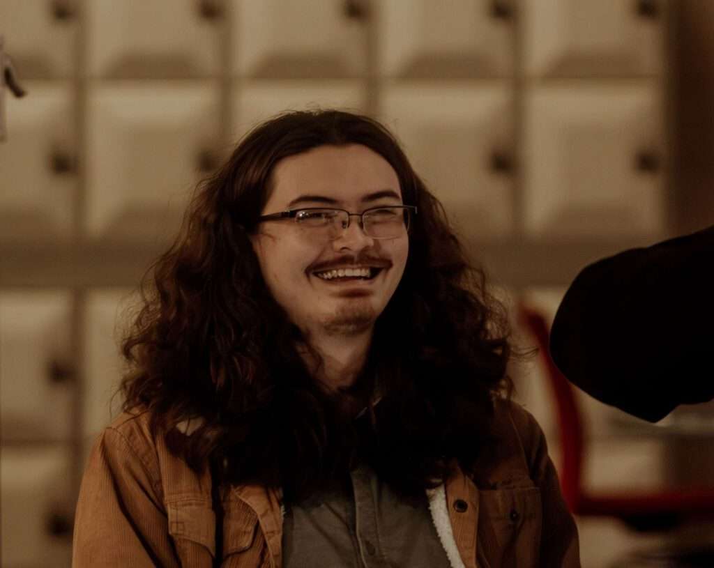 Aaron Scott (he/him)