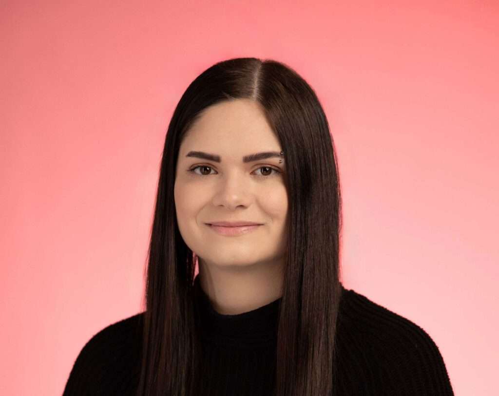 Shay Scholes (she/they)